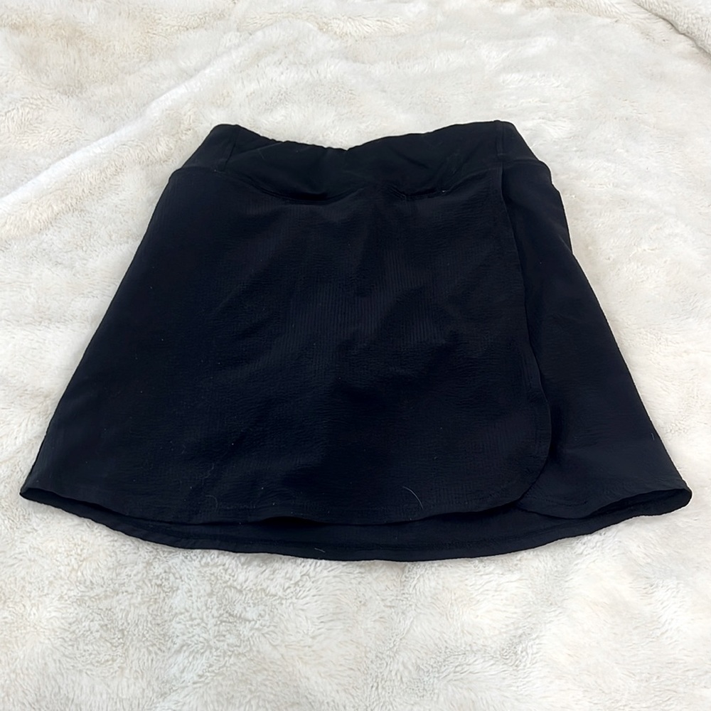 black skirt from Zella, has a slit down the side with connecting spanks under